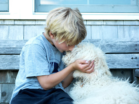 Boy And His Dog Share A Kiss