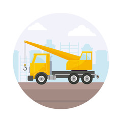 under construction crane truck with cityscape