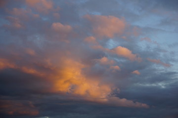 dramatic blue sky with orange clouds