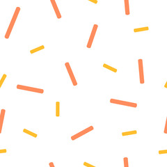 Yellow and orange candy on a white background, seamless pattern