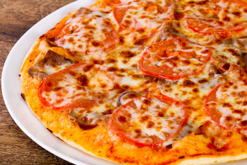 Pizza with beef and tomato