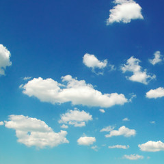 Light clouds in the blue sky.