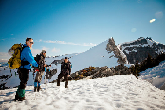 Three climbers approach Grainger Peak, BC, Canada
