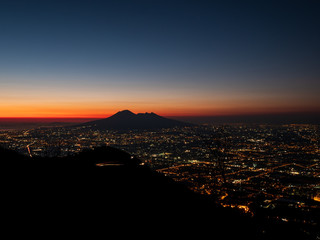 beautiful sunset over the Gulf of Naples and Vesuvius, twilight view, Naples Campania, Italy