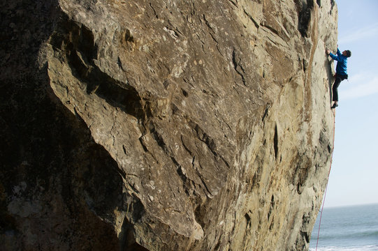 Chris McNamara climbs at Mickey's Beach in Stinson Beach, California.