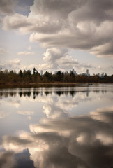 Obraz na płótnie Canvas Burnaby Lake Reflection British Columbia. Cloud reflections on Burbaby Lake, British Columbia, Canada.