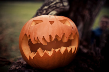 Mean looking carved pumpkin.