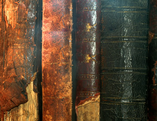 Old torn vintage books. Rare book covers. stack