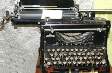 Old vintage rarity printing machine. Typing black.