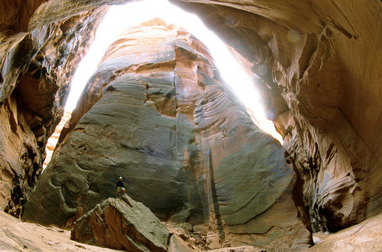 PARIA CANYON, UT - SEPTEMBER 20: Olivier Renck takes a break during a hike into the Buckskin Canyon on the Colorado Plateau, Utah / Arizona on September 20, 2003. (Photo by Olivier Renck/Aurora)