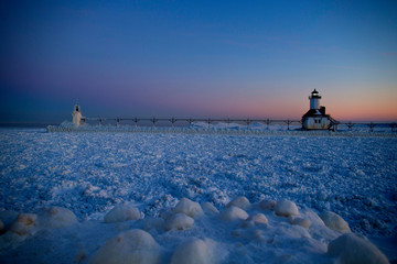 St. Joseph, Michigan, lighthouse is frozen on the shores of Lake Michigan. It dates back to 1859.