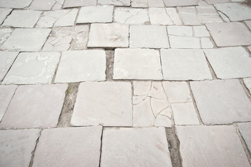 Paving the street in the city. Replacement of old paving tiles. Repairs. Chernivtsi, Ukraine, Europe, March 2019.