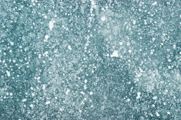 Winter background. Blue ice texture