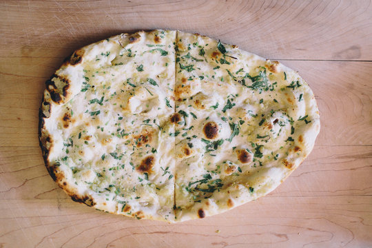 Garlic naan is a specialty Indian and Nepali bread.