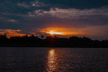 sunset , zambezi river, zambia, zimbabwe