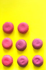 sweet macaroons on yellow abstraction background,with copy space