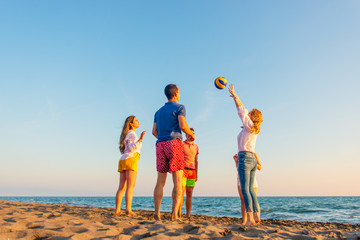 Group of friends enjoy on the beach