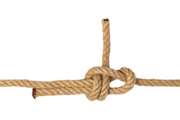 Rope isolated. Closeup of figure node or knot from two brown ropes isolated on a white background. Navy and angler knot or sailorknot. Macro.