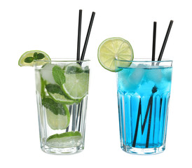 Tasty refreshing cocktails in glasses on white background