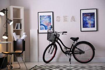 Stylish room interior with modern bicycle. Hipster design