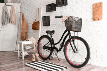 Stylish hallway interior with modern bicycle. Hipster design