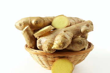Fresh ginger root spice with slice isolated on white background