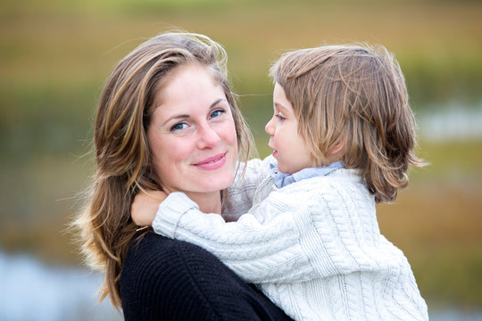 Portrait Of Mother And Son In Natural Setting