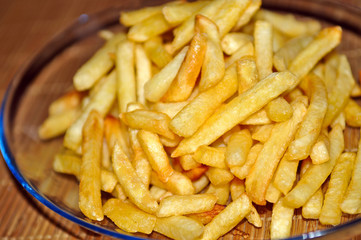 Hot potatoes frying and ready to be eaten