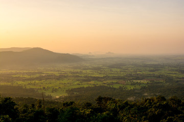 scenery during sunrise time with mountain and savannah field