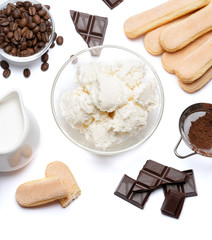 Ingredients for cooking tiramisu - Savoiardi biscuit cookies, mascarpone, cream, sugar, cocoa, coffee and egg