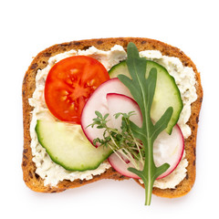 sandwiches with cream cheese, vegetables and salami. Sandwiches with cucumber, radish, tomatoes, salami on a white background, top view. Flat lay.