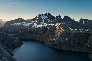 View of lake and surrounding mountains, Lofoten Islands, Norway