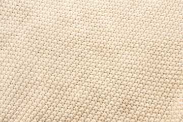 Beige crocheted fabric texture