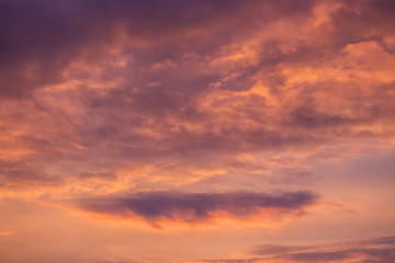Naklejka na ściany i meble Red dark dramatic sky at sunset, background for design_