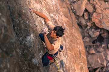 Man rock climbing in?Skaha?Bluffs Provincial Park, ?Penticton, British Columbia, Canada