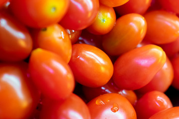 Fresh Roma Tomatoes ready for consumption in a Salad Bar.