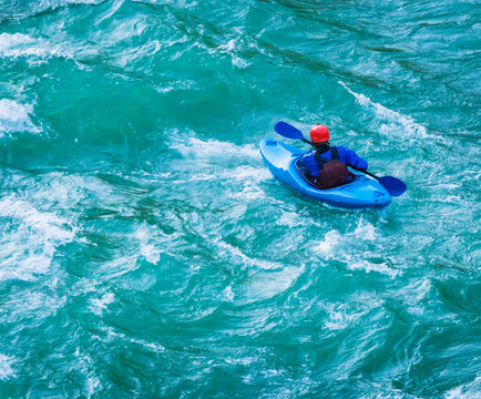 top view of Whitewater kayaking, extreme kayaking. A guy in a kayak sails on a mountain river Ganges in Rishikesh,  India   - Image