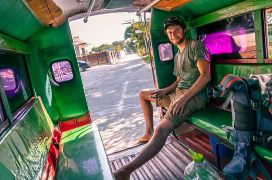 Man sitting in motor rickshaw, Chiang Mai, Thailand