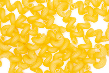 Lot of whole pasta cavatappi flatlay isolated on white background