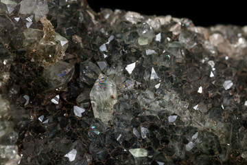 Macro stone mineral smoky quartz on a black background