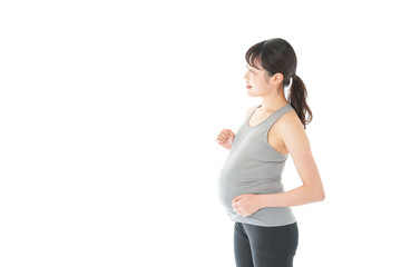 運動をする妊婦