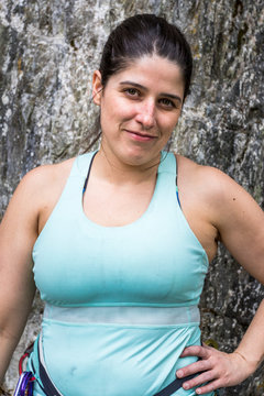 Portrait of female rock climber with black hair, Whistler, British Columbia, Canada