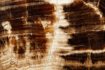 Macro stone mineral onyx marble on a black background