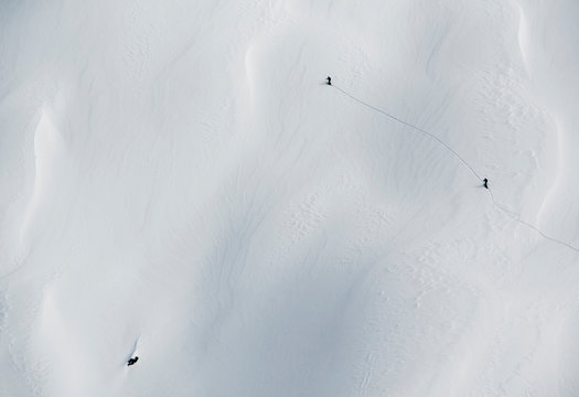 Two Snowboarders Use Splitboards To Climb A Mountains In The Van Titter Valley, Argentina