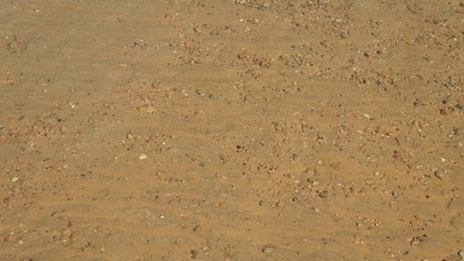 Photo of sand under water. Texture of sand in the lake.