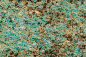 Macro of mineral stone amazonite on a black background