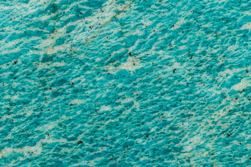 Macro of mineral stone amazonite on a black background