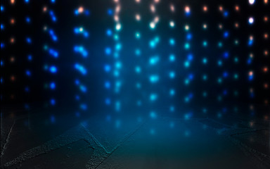 Dark empty stage, multicolored rays of neon searchlight, wet asphalt, smoke, night shooting, bokeh color.