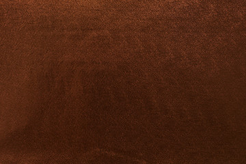 golden background with textural dark highlights and bokeh