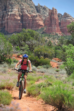 Woman rides the Templeton Trail in South Sedona, Arizona
